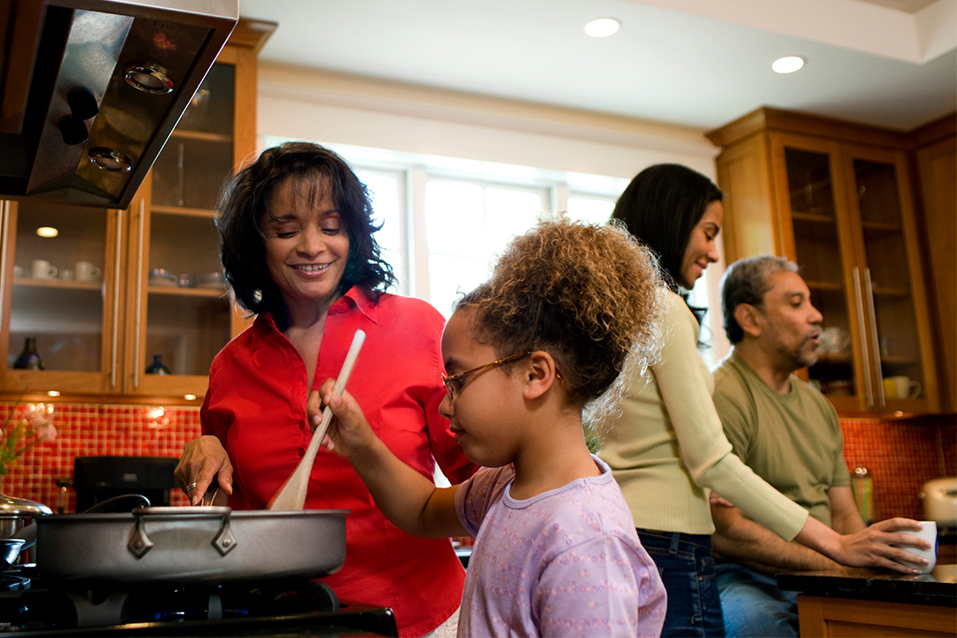family-cooking-secure-happy Family cooking secure happy