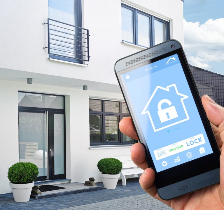 Smart-Home-Locks-768x718 Smart phone next to door look with security interface.